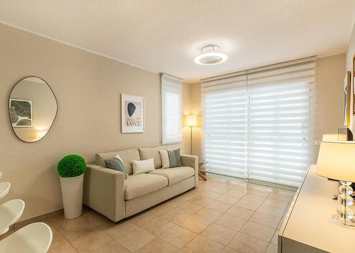 Апартаменты Oasi La Caleta *